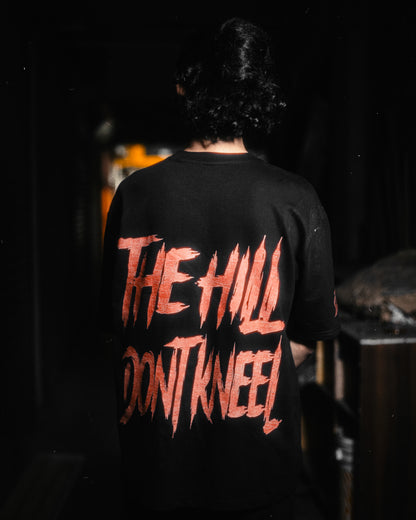 THE HILL DON'T KNEEL